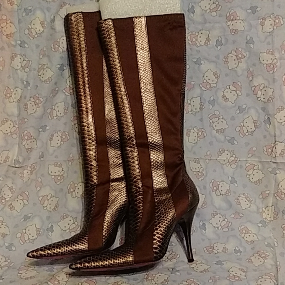 Pointy toed brown boots